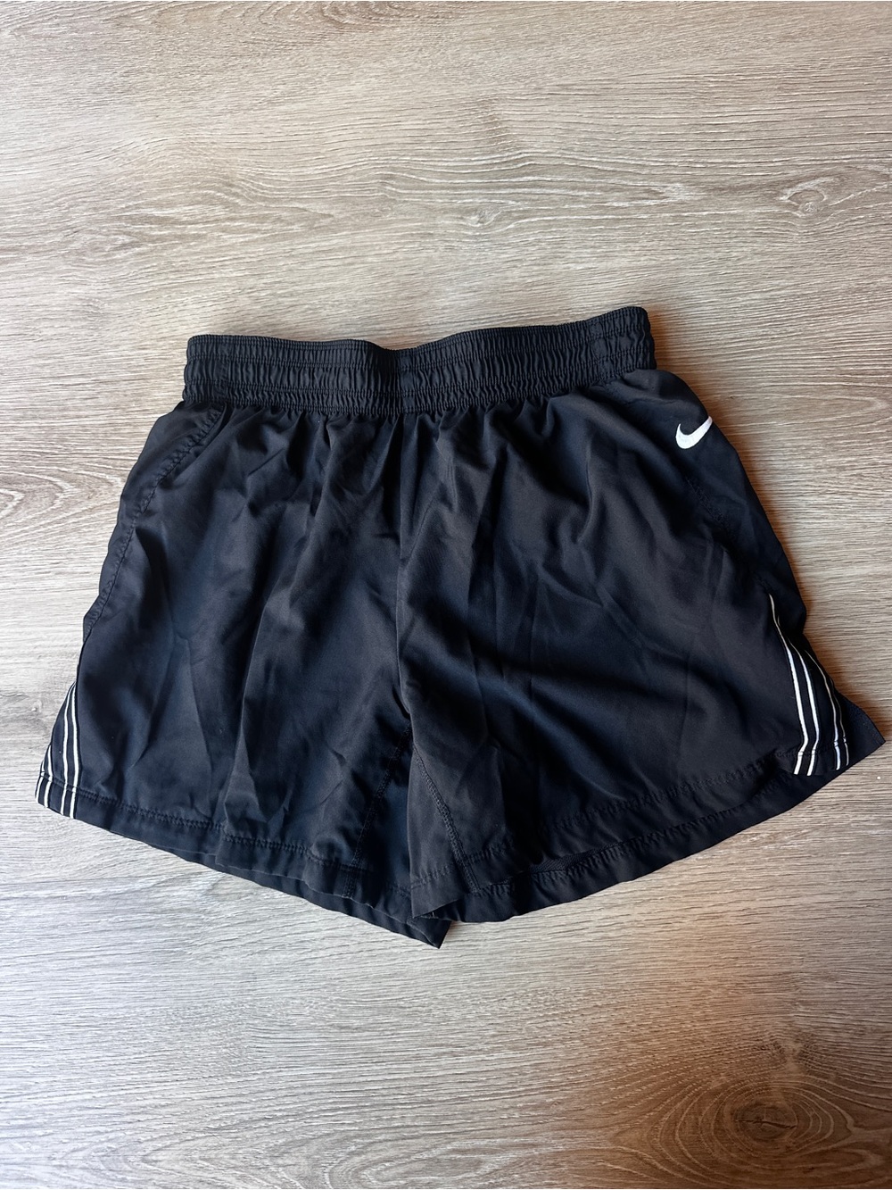 Nike Women’s Black Athletic Shorts with White Swoosh